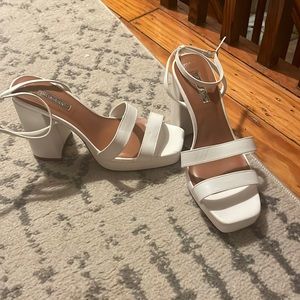White platform heels